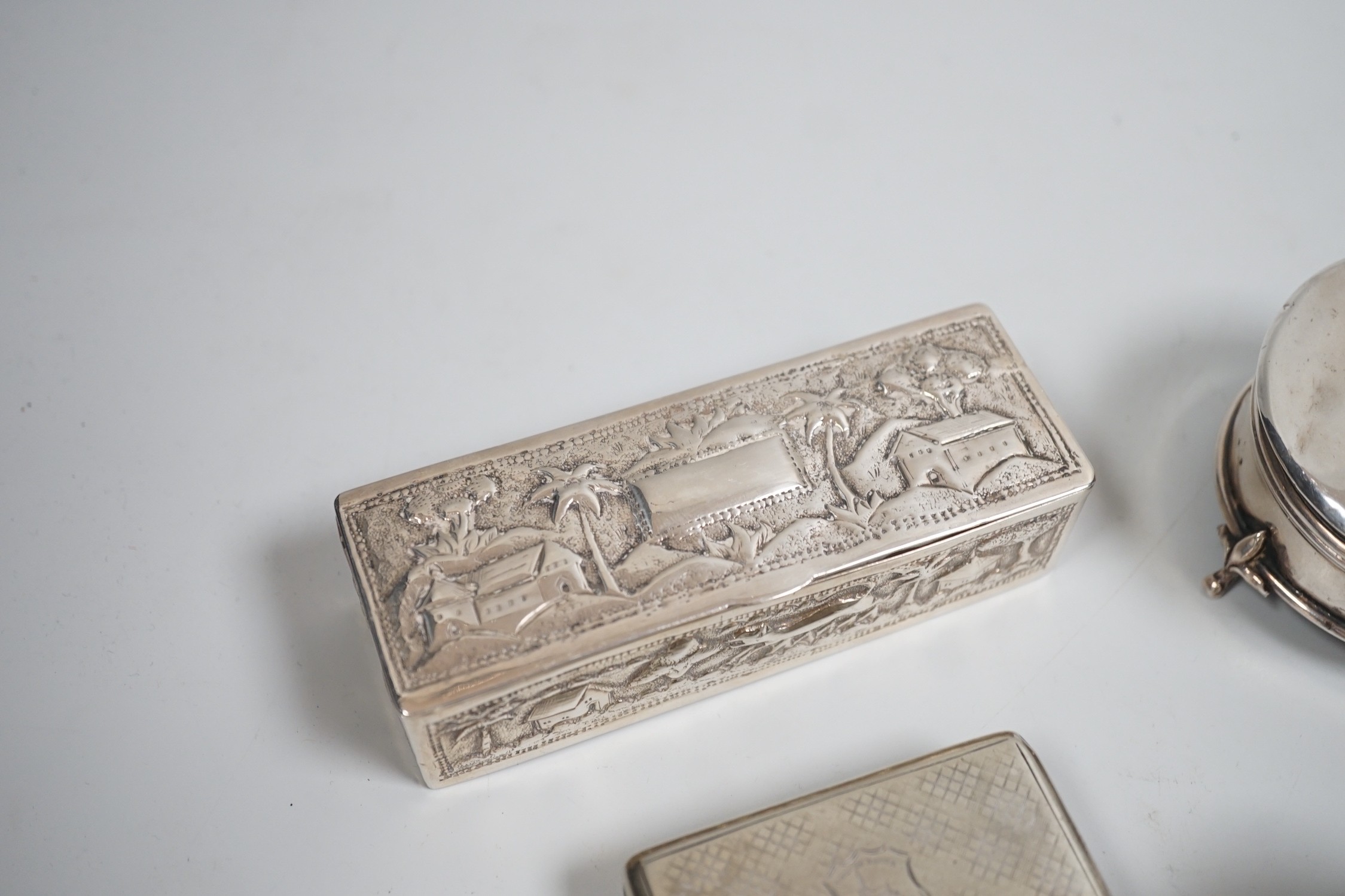A collection of small silver items including two trinket boxes, a damaged mustard pot, two vesta case, snuff box etc. and a white metal box.